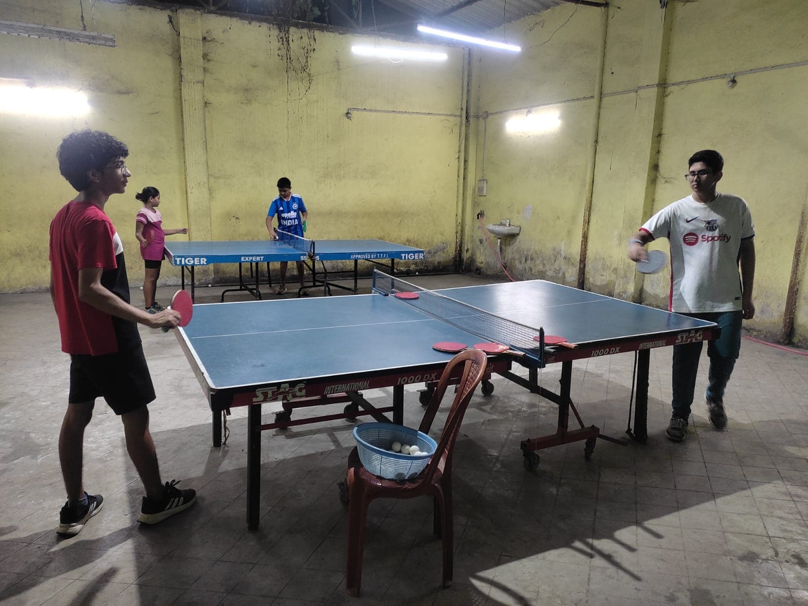 Table tennis in the club hall